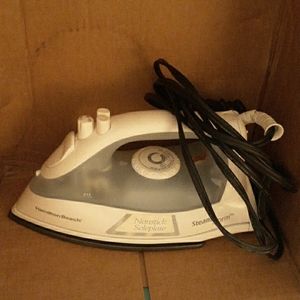 Electric "steam storm" clothes iron